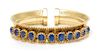 A Retro Yellow Gold and Sapphire Cuff Bracelet, Forstner, 23.90 dwts.