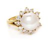An 18 Karat Yellow Gold, Cultured South Sea Pearl and Diamond Ring, 5.15 dwts.