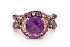 An 18 Karat Bicolor Gold, Amethyst, Diamond and Pink Sapphire Ring, 6.45 dwts.