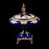 Centro de mesa. Francia, siglo XX.Elaborado en porcelana Limoges en azul cobalto. Decorado con motivos florales, aplicaciones de metal.