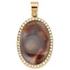 A fire agate and diamond 14K yellow gold pendant.