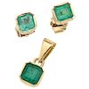 An emerald 18K yellow gold pendant and pair of stud earrings set.