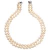 A cultured pearl necklace with diamond 18K white gold clasp.