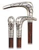 99. Silver Mascot Cane -Ca. 1890 -L-shaped silver handle embellished with an applied luck bringing allegorical panel centered by a horseshoe over an a