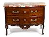 A Louis XV Provincial Commode Height 34 x width 44 x depth 25 inches.