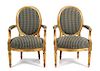 A Pair of Louis XVI Style Giltwood Fauteuils Height 36 inches.