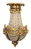 A French Gilt Bronze and Glass Chandelier Height 48 inches.