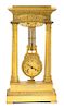 An Empire Gilt Bronze Clock Height 22 inches.