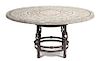 A Mosaic-Top Outdoor Table Height 30 x diameter 60 inches.
