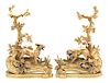 A Pair of Louis XV Style Gilt Bronze Chenets Height 21 3/4 x length 14 3/4 inches.