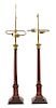 A Pair of English Mahogany Columnar-form Table Lamps Height 32 1/4 inches to finial.