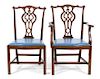 A Set of Eight Chippendale Style Carved Mahogany Dining Chairs Height 39 inches.