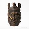 Bangwa Royal Society Helmet Mask, cylindrical form with three faces carved in relief, the fourth side open, the high domed head surmoun
