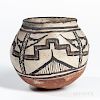Small Zuni Polychrome Pot, c. 1890s, decorated in black and red on a cream slip, with overall craquelure to the surface, ht. 5 in.Prove