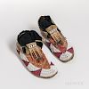 Pair of Plains Beaded and Quilled Hide Moccasins, fourth quarter 19th century, with three lanes of white beads wrapping each moccasin,