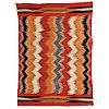 Navajo Weaving, c. 1890, multicolored "eye dazzler" design on a red background, 70 x 49 in.Provenance: Private collection, Leverett, Ma