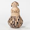 Contemporary Acoma Pottery Figure, Juana Leno (1917-2000) Syo-ee-mee, the woman wears turquoise earrings, signed on base, ht. 8 1/2 in.