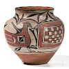 Santo Domingo Polychrome Pottery Olla, early 20th century, with concave bottom, high shoulder, and decorated with two stylized birds an