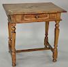 Continental baroque pine and walnut side table, rectangular top above a single frieze drawer and raised on square section and balust...