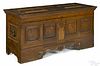 German oak chest, 18th c., the lid and façade with raised panels adorned with inlaid birds