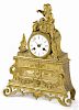 French gilt bronze mantel clock, late 19th c., adorned with a young girl feeding a rabbit
