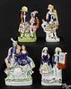 Four Staffordshire Scottish subject figural groups, 19th c., tallest - 13 1/2''.