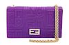 A Fendi Purple Monogram Embossed Leather Wallet/Shoulder Bag, 4" H x 7.5" W x .75" D; Strap drop: 19".