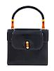 A Gucci Navy Leather Vintage Flap Handbag, 7.25" H x 8" W x 2.75" D; Handle drop: 4".
