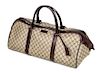 * A Gucci Monogram Canvas Duffle Bag, 9.5" H x 21.5" W x 10.5" D; Handle drop: 6".