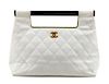 A Chanel White Caviar Quilted Melrose Cabas Wood Handle Bag, 10.5" H x 13.5" W x 4.5" D; Handle drop: 2".