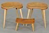 Three Thomas Moser cherry stools, two with molded seats and a small stool marked on bottom.