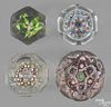 Four antique faceted millefiori paperweights, largest - 3'' dia.