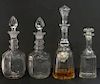4 CRYSTAL DECANTERS 1 W/ SHERRY MASCOT W/ ENGLISH