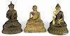 Three Tibetan gilt bronze figures of Buddha, tallest - 6''.