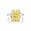 A 10.08-Carat Fancy Yellow Diamond Ring