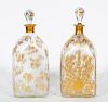 Two Delvaux Gilt Floral Painted Glass Decanters