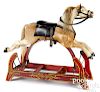 Hide covered wooden rocking horse