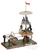 German two-tier painted tin steam toy carousel