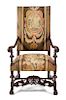 A Louis XIII Style Fauteuil Height 47 1/4 inches.