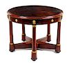 An Empire Style Gilt Metal Mounted Mahogany Center Table Height 29 x diameter 37 1/2 inches.