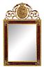 * A Neoclassical Gilt Metal Mounted Mirror Height 53 x width 31 1/2 inches.