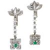 An emerald and diamond 18K white gold pair of earrings.