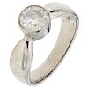A 10K white gold solitaire ring.