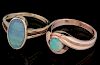 TWO LADIES' 14K GOLD AND OPAL FASHION RINGS