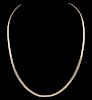 A CONTEMPORARY 14K GOLD SERPENTINE CHAIN NECKLACE