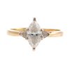 A Ladies Marquise Diamond Engagement Ring in Gold