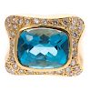 A Ladies 18K Blue Topaz & Diamond Ring