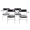 Four contemporary vinyl & chrome arm chairs