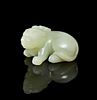 A Carved Jade Figure of a Bixie Width 2 5/8 inches.