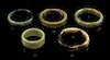 * A Group of Five Jade Bangles. Diameter of largest 3 1/2 inches.